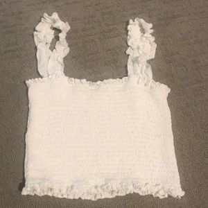 Cropped white frilly top
